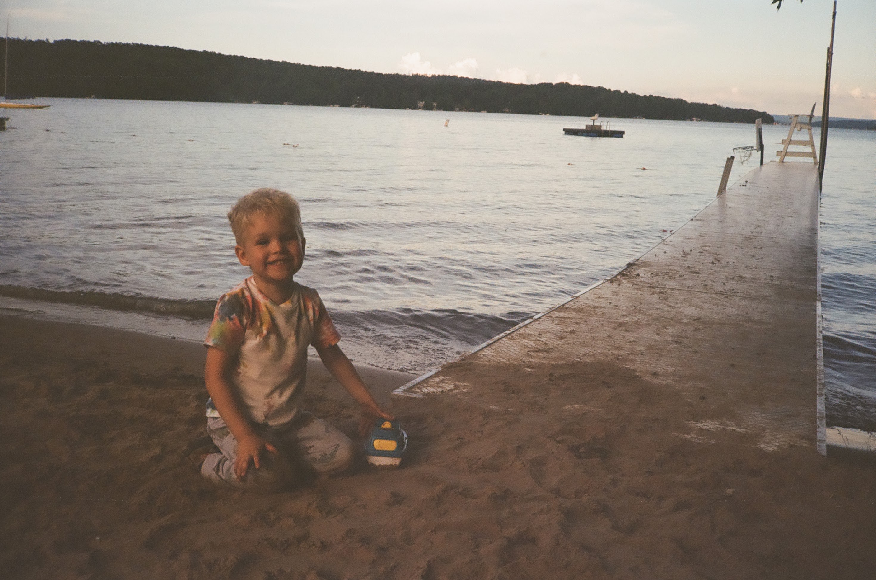 Bryce at the beach with boat